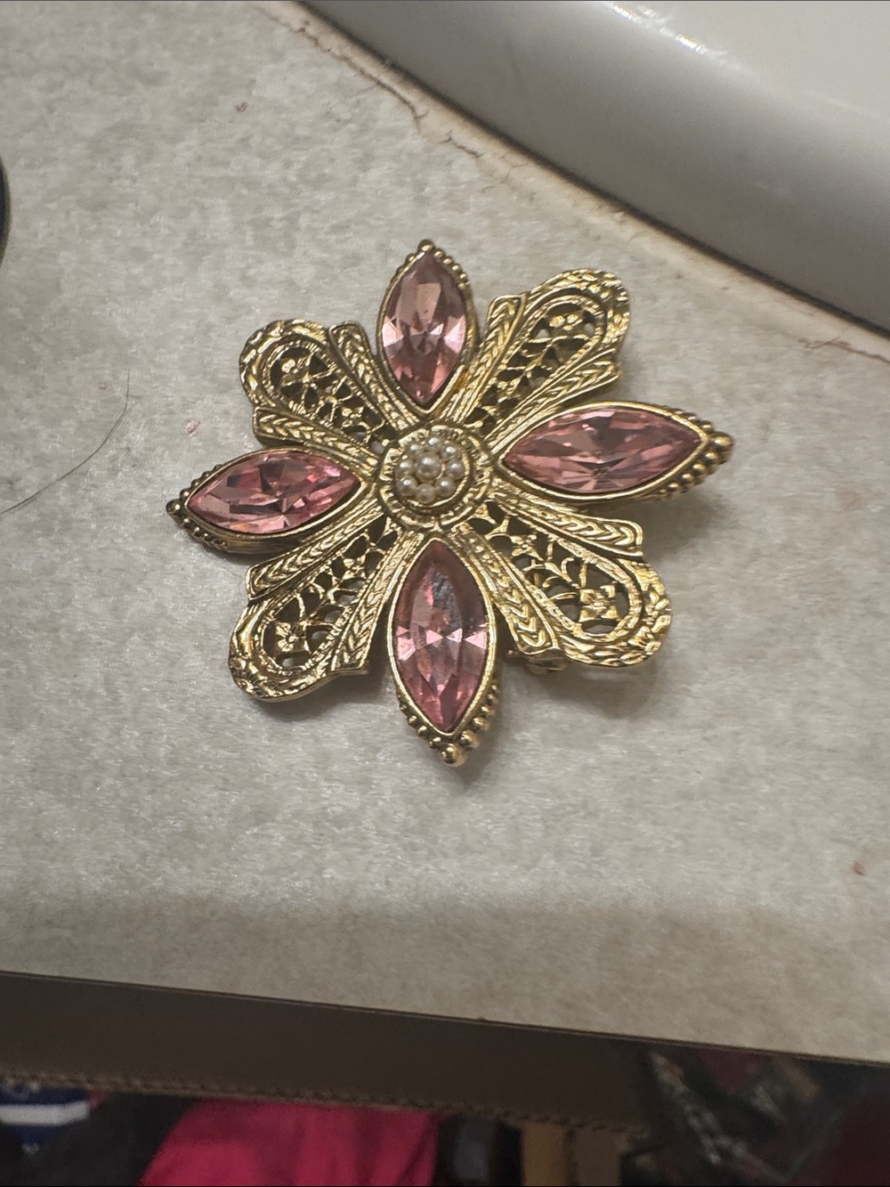 Gold-Tone Floral Brooch with Pink Stones and Pearl Center
